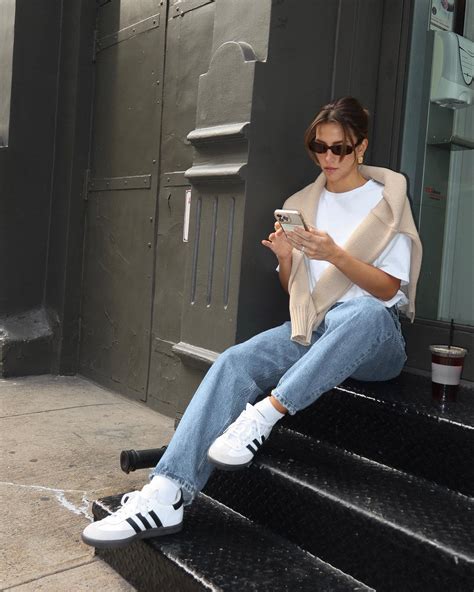 flattering jeans with sneakers.